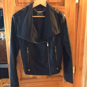 Bomber jacket with faux leather.